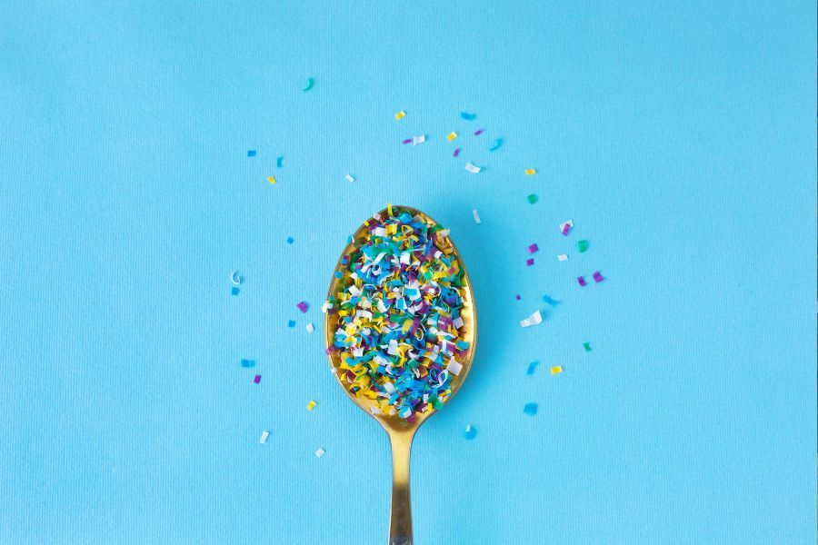 small plastics on top of a spoon